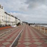 Looking eastward along the promenade to Hastings pier