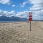 Signpost on the beach at Ballykinler Upper