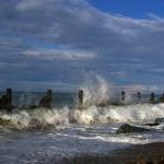 Incoming tide and sea defences, West Runton