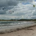 Kite surfers in Beadnell Bay