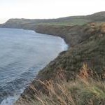 High tide from the clifftop above Stoupe Beck Sands