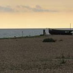 Open Fishing Boat on the shingle beach at Goring