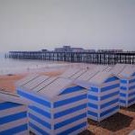 Beach huts and pier