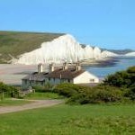 Seven Sisters cliffs and the coastguard cottages, from Seaford Head showing Cuckmere Haven