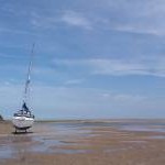 Yacht moored at Red Wharf Bay/Treath Coch,  Anglesey